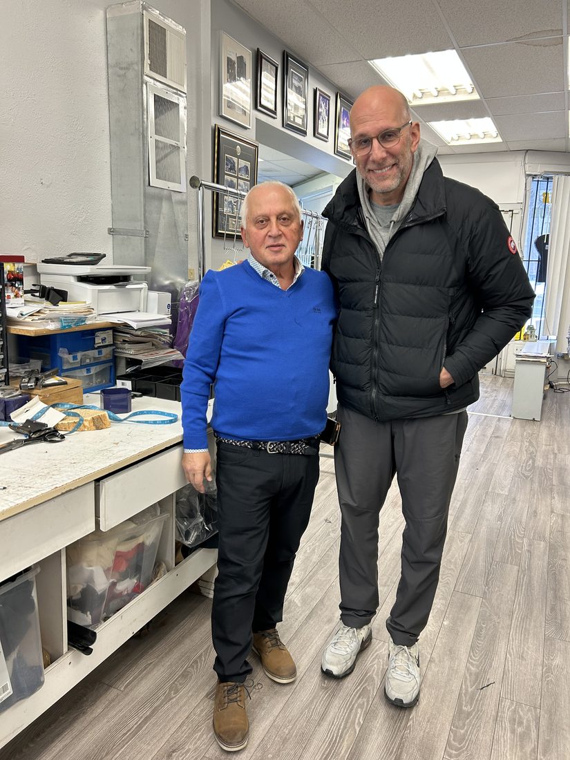 Dan Shulman — sportscaster — with the master tailor at Paul's Tailors